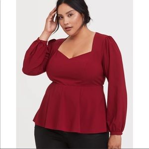 Red peplum torrid top.